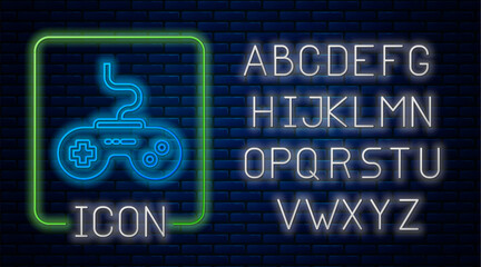 Wall Mural - Glowing neon Gamepad icon isolated on brick wall background. Game controller. Neon light alphabet. Vector