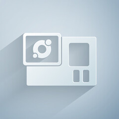 Sticker - Paper cut Action extreme camera icon isolated on grey background. Video camera equipment for filming extreme sports. Paper art style. Vector