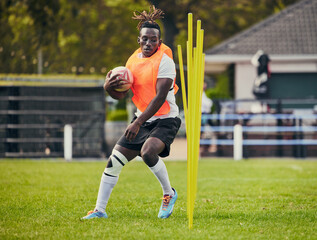 Canvas Print - Rugby, sports and black man training with equipment ready for match, practice and sport games. Fitness, performance and serious male athlete running for warm up, exercise and workout for competition