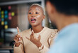 © A. Frank/peopleimages.com - Black woman, explain and talking team, office friends or business people consulting on proposal. Conversation, collaboration and networking employees speaking, chat and discussion on strategy