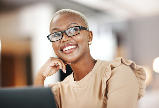 black woman, thinking and smile, relax at desk with laptop for content creation ideas at digital mar