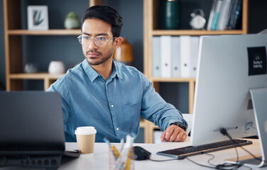 Fototapete - Serious, laptop and business man in office for startup management, digital planning and trading. Focused male worker at computer technology for online project, website and internet research at table