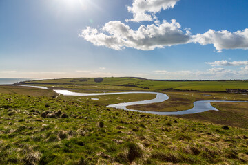 Wall Mural - The Cuckmere River winding through the Sussex countryside towards the coast