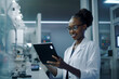 © VicenSanh - Sciencie research and black woman with table, in laboratory, generative ai