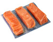 Salmon slices in vacuum packed sealed for sous vide cooking isolated on white, clipping path included