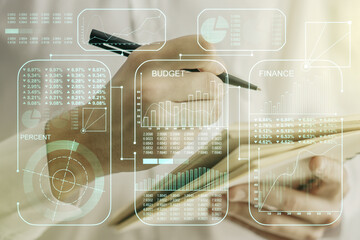 Poster - Double exposure of abstract creative statistics data hologram with man hand writing in notebook on background, statistics and analytics concept