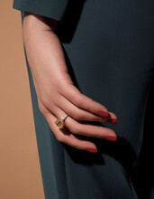 Cropped View Of Young Woman Hands With Ring, Isolated On Black Background. Silver Ring On A Female Hand, Diamonds Diamond Ring In Hands Of Young Lady. Close-Up Photo Shoot. Adornment.