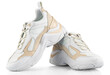 White leather sport sneakers isolated on transparent background. Full Depth of Field
