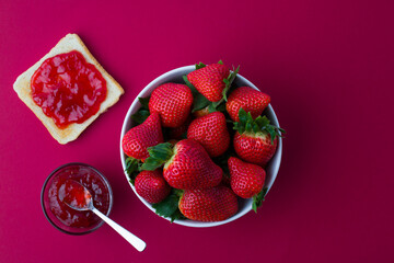 Wall Mural - Strawberry jam in the glass jar with fresh berries.