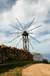 Vertical shot of the windmill in the mountains