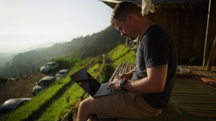 Wall Mural - Caucasian male typing on laptop