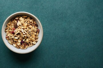 Sticker - Muesli and granola bar overhead in round bowl on table for healthy breakfast., created with generative ai