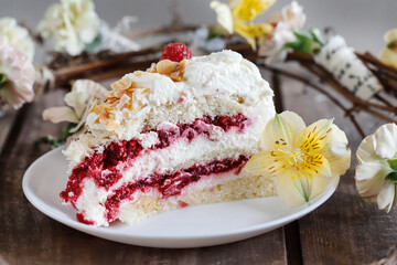 Wall Mural - Layer fruit cake with meringue topping and raspberry sauce.