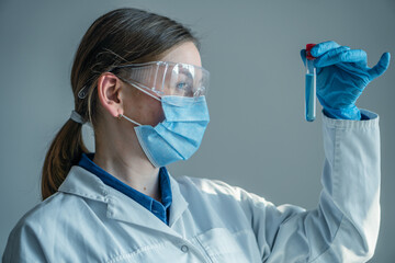 Aufkleber - Medical research laboratory. A scientist works with a pipette and a test tube. Scientific laboratory of biotechnology, development of medicine and research in chemistry, biochemistry and experiments.