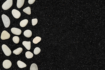 Wall Mural - black sand with pebbles - beach background