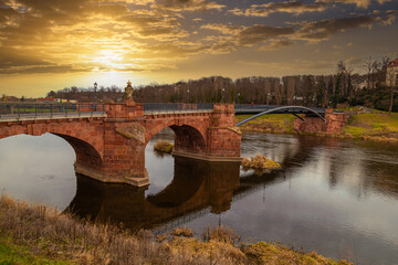 Wall Mural - Scenic Pöppelmann bridge over the Mulde river. Old Grimma town. Germany.