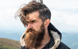 © be free - unshaven brutal man having moustache. photo of brutal man in the mountain. brutal man outdoor
