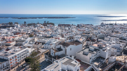 Wall Mural - Aerial view of the Portuguese fishing tourist town of Olhao overlooking the Ria Formosa Marine Park. church Matriz de Nossa Senhora do Rosario