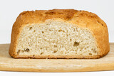 Fototapeta Storczyk - Delicioso pan casero recién horneado, sobre madera y de cerca. Serie