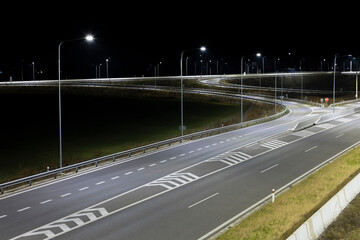 highway at night with modern LED lamps