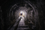 Fototapeta Perspektywa 3d - Vaulted tunnel with concrete walls in old abandoned bunker, mine, drainage, subway, etc