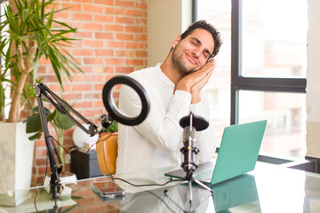 Wall Mural - young hispanic man lazily early in the morning, waking and looking sleepy, tired and bored. influencer concept