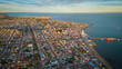 Aerial Drone Fly Above City of Punta Arenas Chile, Panoramic Cityscape in Summer Clear Sky, Ocean, Beautiful Port Town in Patagonia