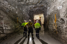 Miners Underground Inspecting Work In Progress At A Mine Site In Australia