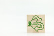 Wooden cubes with green zero carbon icons on white background. Zero carbon and net zero emissions concept. Climate neutral long term strategy. Sustainable business development.