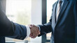 © Matyfiz - Businessman handshake for success deal in business merger and acquisition, development opportunity achievement as business partnership and consolidate. Generative AI