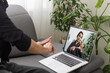 © Angelov - Young man showing gesture in sign language using laptop, make video call
