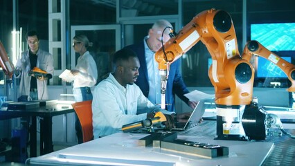 Wall Mural - researchers are holding an experiment with a robotic arm