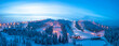 © robertharding - Winter dusk over the snowy ski slopes of Ruka tourist resort, aerial view, Kuusamo, Northern Ostrobothnia, Lapland