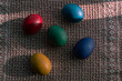 easter eggs on red cloth