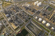 © Teppakorn - Oil refinery plant from industry zone, Aerial view oil and gas petrochemical industrial.