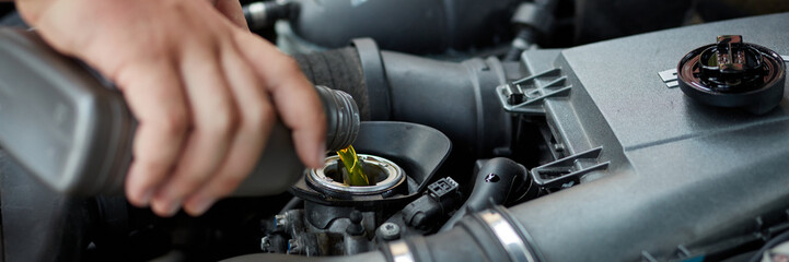 Refilling the oil in the car