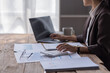 © David - Business Asian woman working at office with documents on her desk, calculator to calculate planning analyzing the financial report, business plan investment, finance analysis concept