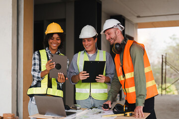 Wall Mural - Engineer and Foreman builder team at construction site. American African foreman construction standing at construction site