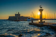 © robertharding - View of bronze stag and doe statues and Saint Nicholas Fortress at sunrise, UNESCO World Heritage Site, City of Rhodes, Rhodes, Dodecanese Islands, Greek Islands