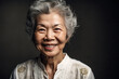 © ADDICTIVE STOCK - Happy elderly woman over dark background. Generative AI.