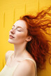 © ADDICTIVE STOCK - Red-haired woman with closed eyes. Generative AI