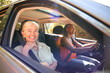 © Monkey Business - Two Senior Female Friends Enjoying Day Trip Out Driving In Car Together