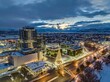 Drone shot of buildings and a light Christmas tree in Kelowna, British Columbia, Canada