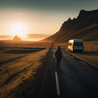 © LouisMarie - Coucher de soleil sur paysage montagneux et fourgon aménagé et personne seule sur la route