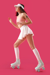 Poster - Young woman in roller skates on pink background