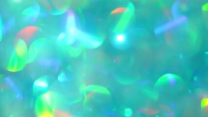 Canvas Print - Bokeh With Rainbow Holographic Reflexes. Abstract glow defocused circles moving background. Multicolored bokeh lights in motion.