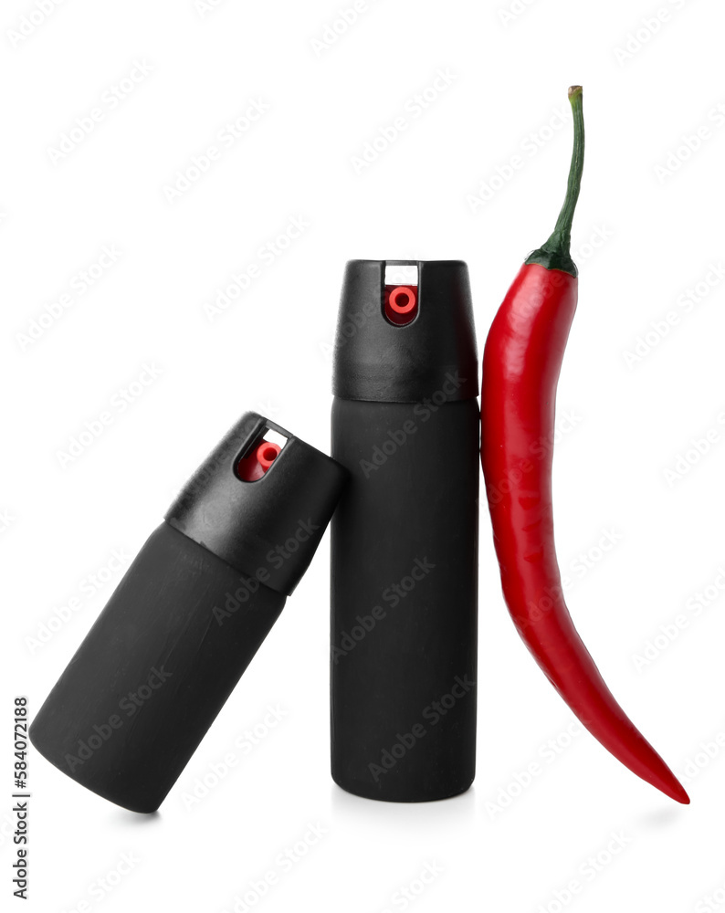 Sprays with chili pepper on white background