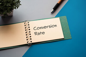 Leinwandbilder - There is a notebook with the word Conversion Rate. It is eye-catching image.