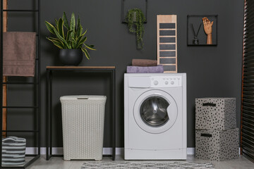 Canvas Print - Stylish laundry room with washing machine. Interior design