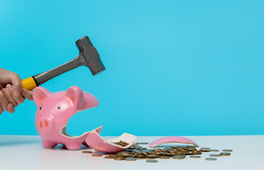 Wall Mural - Crush the piggy bank with a hammer